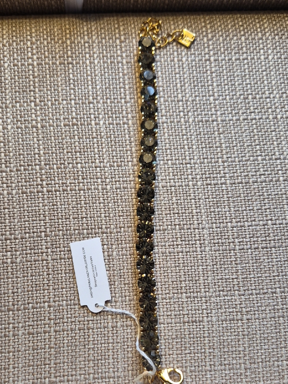 Gold Tone Bracelet with Black Stones